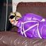 Pia tied and gagged with ropes and a ballgag with eye patches wearing a sexy crazy sensation down pants and a purple down jacket (Pics)