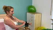 helium overinflating six balloons in white lingerie