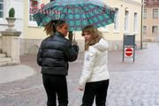 Stella and Leonie having fun with eachother in the rain wearing sexy downjackets (Pics)
