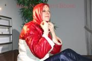 Lucy ties, gagges and hoodes herself in bed wearing a sexy blue rain pants and an oldschool red/white down jacket (Pics)
