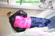 Sonja wearing a sexy rainwear combination taking a bath with shaving foam in the bath tub  Part 1 of 2 (Pics)