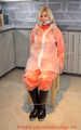 Miss Francine in AGU raingear and transparent raingear (original AGU) bound and gagged on a chair