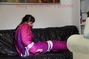 Mara tied and gagged ob a black sofa wearing a supersexy pink downwear (Pics)