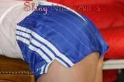 Sexy Pia being tied and gagged with ropes and a cloth gag on a stool wearing a sexy blue shiny nylon shorts and a tshirt (Pics)