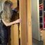 Watching sexy Sandra wearing a black shiny nylon jumpsuit doing her housework (Video)