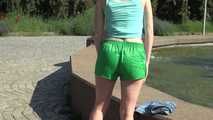 SEXY ***SONJA*** wearing a sexy green shiny nylon shorts under her Jeans walking through the city  (Video)