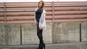 Miss Petra in transparent Hunter rain jacket and patent leggings