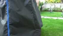 Watch Maly in her shiny nylon Shorts enjoying the warm Weather in the Garden