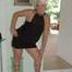 Blonde mature Claudia stipping out of a black dress