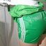 Sonja tied and gagged in a shower cabine with tape and rope wearing a very hot green shiny nylon shorts and a green rain jacket (Pics)
