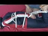 04:35 Min. video with Julia tied and gagged in a blue skisuit
