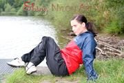 Enni outdoor wearing shiny nylon shorts rain pants and rain jacket (Pics)