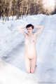 Claudia barefoot in snow - 2
