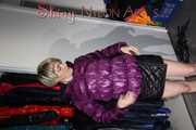 Watching SEXY SONJA wearing a sexy black shiny downskirt and a purple shiny nylon downjacket lolling on the bed (Pics)