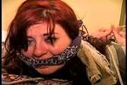 23 YR OLD REAL ESTATE BROKER IS RING GAGGED, DROOLING, BALL-GAGGED , BANDANNA & SCARF CLEAVE GAGGED HANDGAGGED, STINKY SOCK STUFFED IN MOUTH AND HOG-TIED ON BED (D74-2)