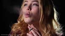 Sunny girl Nastya is smoking 120mm cigarette