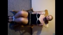 Tied up and gagged in a rocking chair