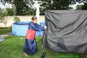 Watch Sandra in the Garden wearing a Rainskirt and Rainjacket