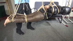 Aiyana bound gagged and suspended ind Shiny nylon down Pants and Jacket
