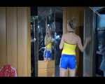 ***NEW MODEL*** Sandra wearing highheels and a sexy blue/yellow shiny nylon shorts and a yellow top during cleaning the mirror (Video)