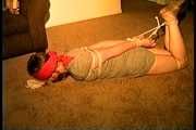 25 Yr OLD NEWS PAPER REPORTER IS BALL-GAGGED, HOG-TIED, DROOLING, FEET TAPED IN PLASTIC, SPANKED AND BLINDFOLDED  (D74-6)