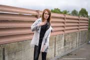 Miss Petra in transparent Hunter rain jacket and patent leggings