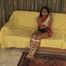 Video: Helpless asian girl is all roped up on the couch.