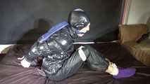 Ronja tied and gagged in shiny nylon Downwear