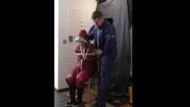 Lady Nadja getting bound and gagged by a raincoated stranger