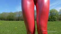 Red leggings on a green meadow
