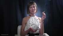 34 years old lady is smoking cork 100mm cigarette