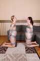 Bekki and Kelly - Sisters are taped and wrapped together face to face