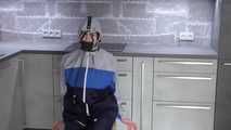  Miss J ziptied in raingear and gagged with inflatable gag