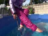 Watch Sandra enjoying her shiny nylon Downwear at a warm Summer Day in the Garden and in the Pool