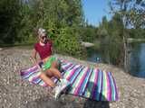 Watch Chloe enjoying her Shiny nylon Shorts in Nature