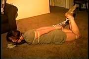 25 Yr OLD NEWS PAPER REPORTER IS BALL-GAGGED, HOG-TIED, DROOLING, FEET TAPED IN PLASTIC, SPANKED AND BLINDFOLDED  (D74-6)