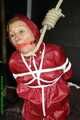 Watch Sandra enjoying Bondage in her shiny nylon Rainwear beeing noosed