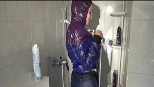 Watching Jill during taking a shower and foaming herself with shaving cream wearing sexy shiny nylon rainwear with hood (Video)