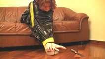 [From archive] Stella - taped sitting with yellow duct tape and packed into trash bag (video)