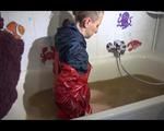 Mara wearing a sexy shiny nylon shorts and a rain jacket enjoying mud in her bath tub (Video)