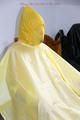 Jill tied and gagged on a chair wearing a yellow rainsuit and coveres with an yellow raincoat with two hoods (Pics)