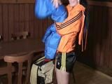 Jill Diamond wearing a sexy shiny nylon shorts and a rain jacket traing on other shorts and jackets (Video)