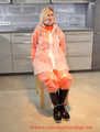 Miss Francine in AGU raingear and transparent raingear (original AGU) bound and gagged on a chair