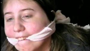 19 Yr OLD CRYSTAL IS CLEAVE GAGGED, SMELLS HER STINKY NYLONS, BAREFOOT, TOE-TIED & HOG-TIED ON THE FLOOR (D56-8)