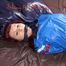 Mara tied and gagged on bed wearing s shiny blue PVC sauna suit (Pics)