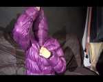 Sexy SANDRA wearing a shiny black rain pants and a purple down jacket with totally closed hood lolling on a sofa (Video)