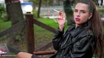 Gorgeous brunette Olya is smoking cork Marlboro Red