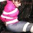 Mara tied, gagged and hooded with tape on a sexy black covered sofa wearing a supersexy grey rain pants and a pink rain jacket (Pics)