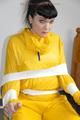 Jill tied and gagged on a chair wearing a yellow rainsuit and coveres with an yellow raincoat with two hoods (Pics)