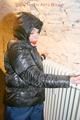 Jill tied and gagged on a heater wearing a shiny black down jacket and a darkblue rain pants (Pics)